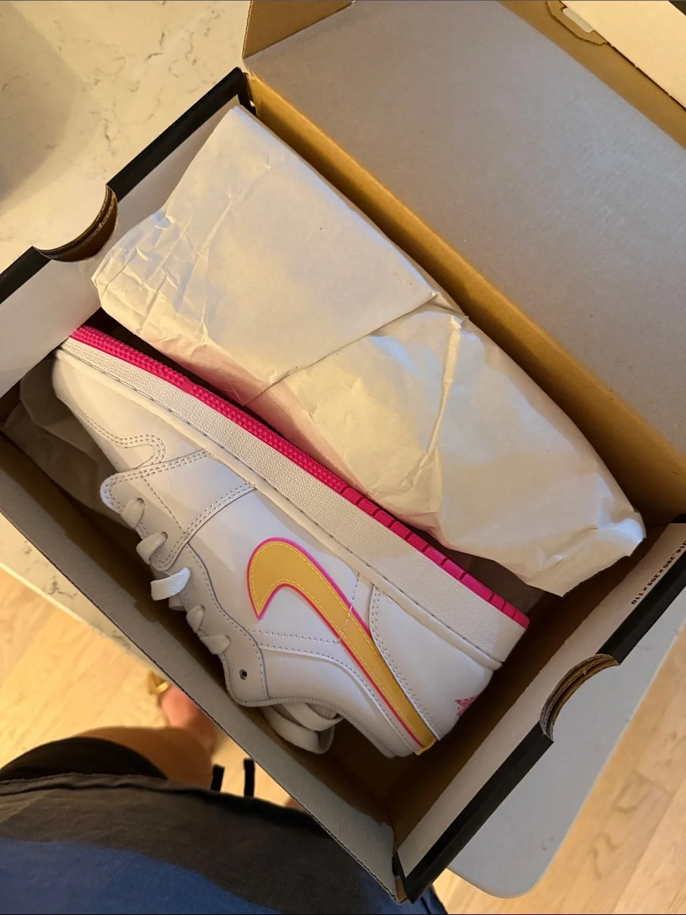 Nike Kids White Sneakers with Yellow and Pink Swoosh